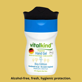Vitalkind hand gel bottle on a yellow background