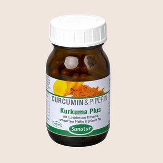 Bottle of Curcumin & Piperin supplement with a beige background