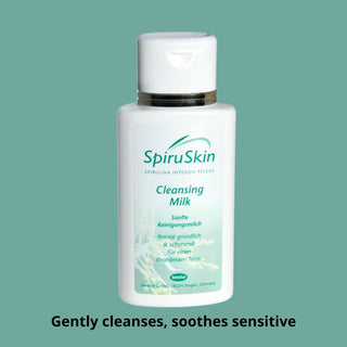 SpiruSkin Cleansing Milk bottle on a green background