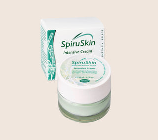 SpiruSkin Intensive Cream jar and packaging on a beige background