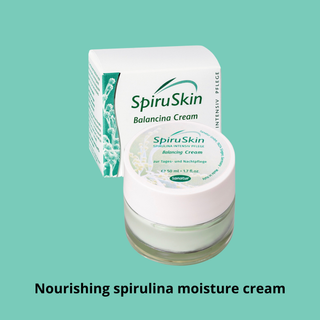 SpiruSkin Balancing Cream with packaging on a teal background