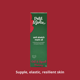 Petit & Jolie anti stretch mark oil packaging on a red background
