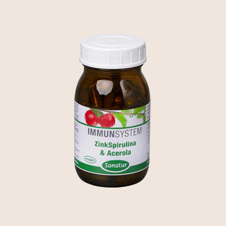 Bottle of immune system supplement with label on a white background