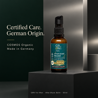GRN after shave balm COSMOS Organic and Made in Germany on smooth dark background