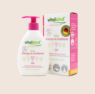 Vitalkind Shiny Shampoo & Conditioner for girls with packaging on a beige background